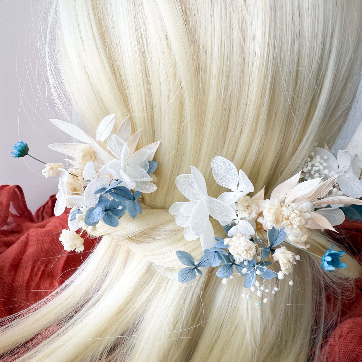 Elegant blue flower hair pins for wedding updo or bridesmaid look