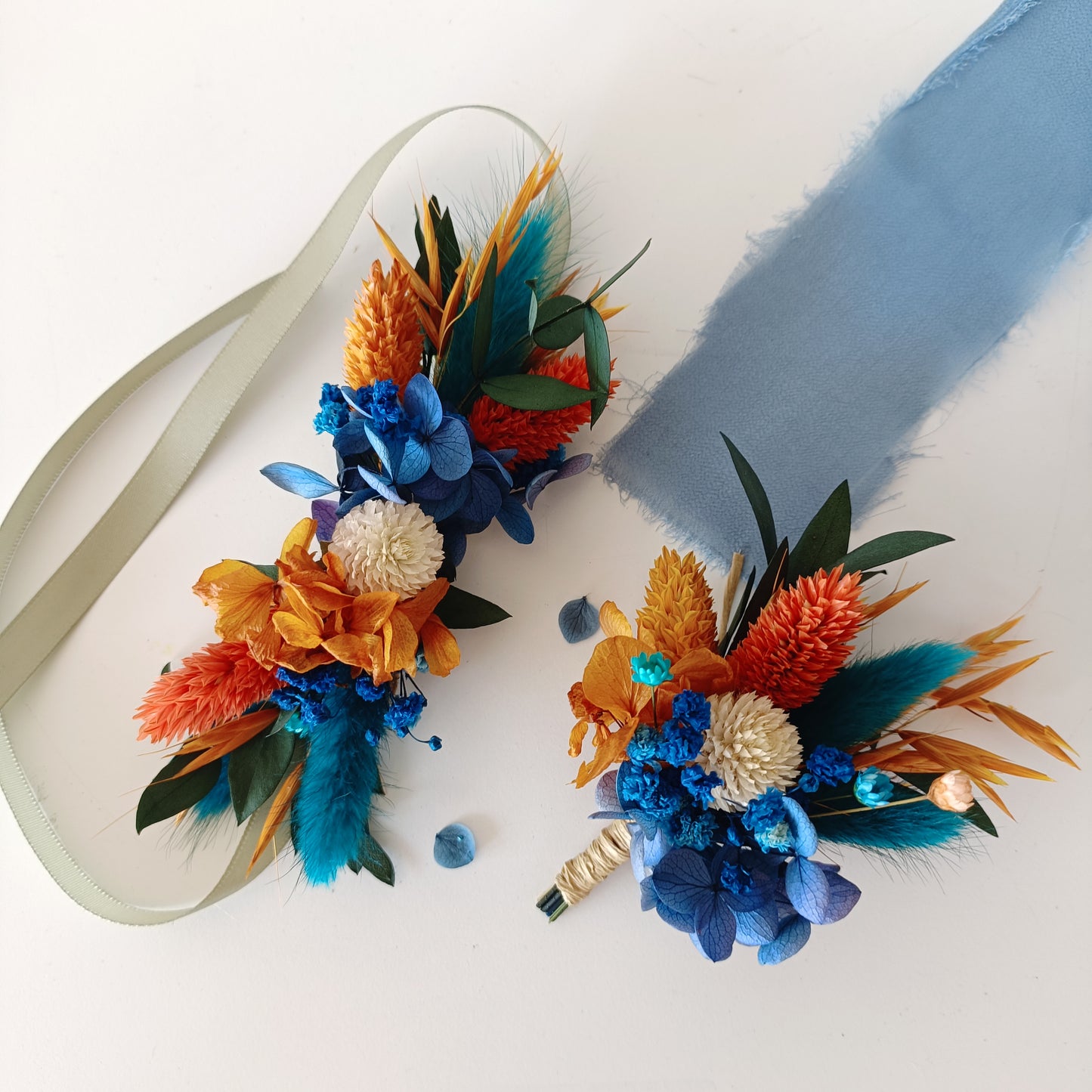 Handcrafted floral accessories in vibrant hues, perfect for a rustic or boho-style wedding.