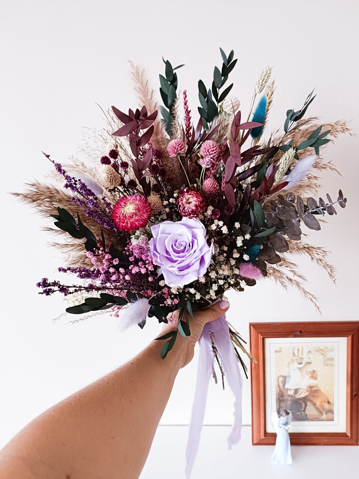 Handcrafted bouquet with preserved flowers and lilac rose, ideal as a lasting gift for weddings, anniversaries, or home decor.