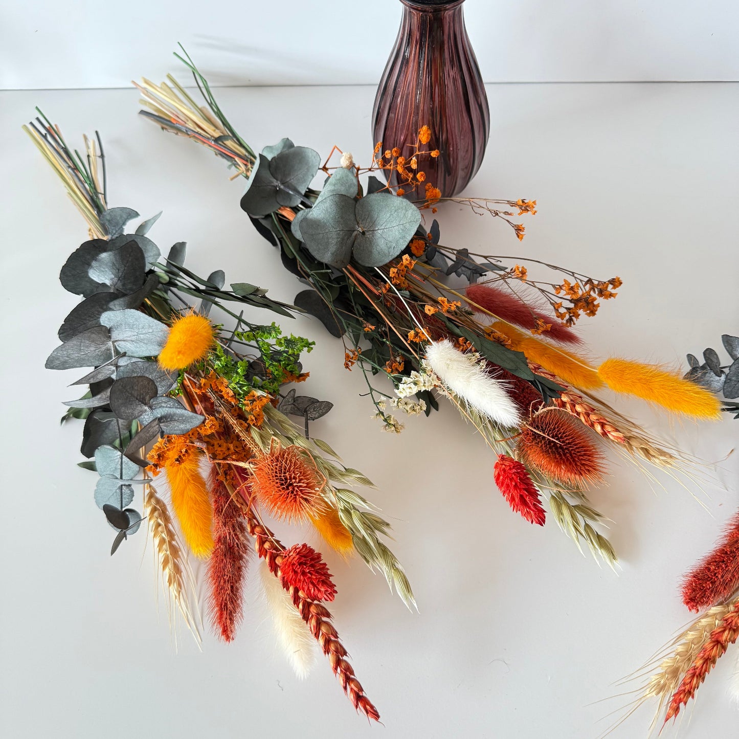 Australian native dried flower bouquet with preserved eucalyptus, banksia, bunny tails and wheat in warm orange, yellow and rust tones, handmade dried floral arrangement for home decor and gifting