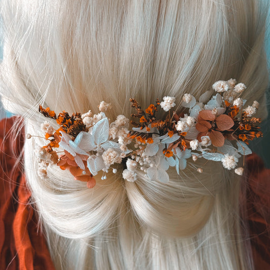 Back view of a boho bridal hairpiece with burnt orange preserved flowers and ivory accents, perfect for rustic Australian weddings