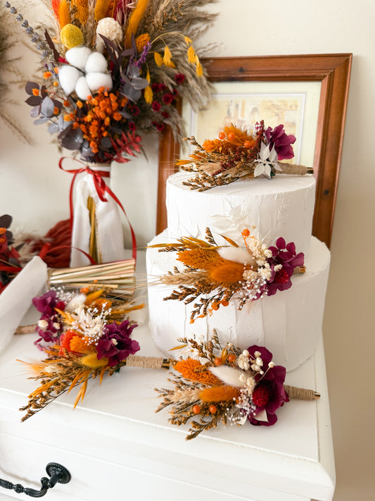 Rustic wedding cake with dried flower decorations – burnt orange, burgundy, pampas grass, preserved florals, terracotta boho cake toppers