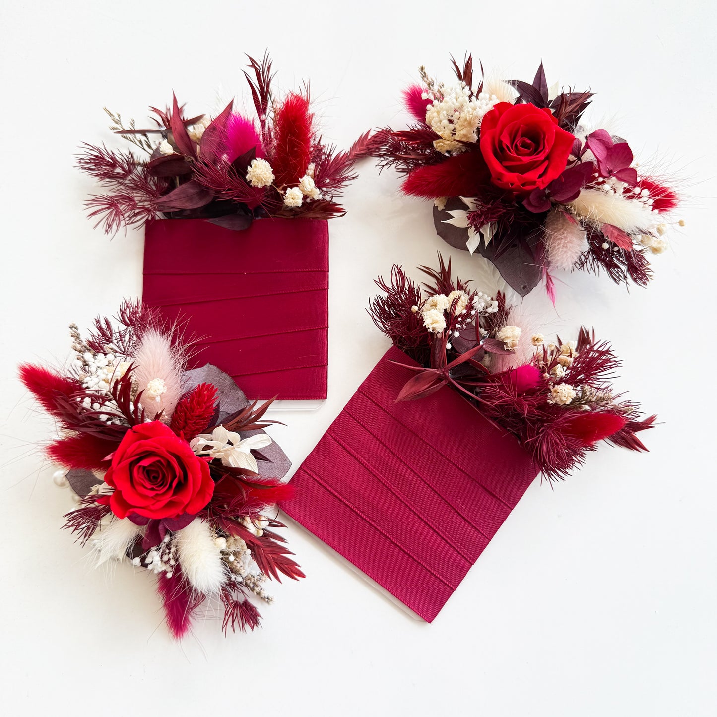 Handcrafted red dried flower arrangement with sola roses, bunny tails and preserved foliage, beautifully styled in a deep burgundy gift box. Perfect as a romantic gift, wedding décor or Valentine’s arrangement.