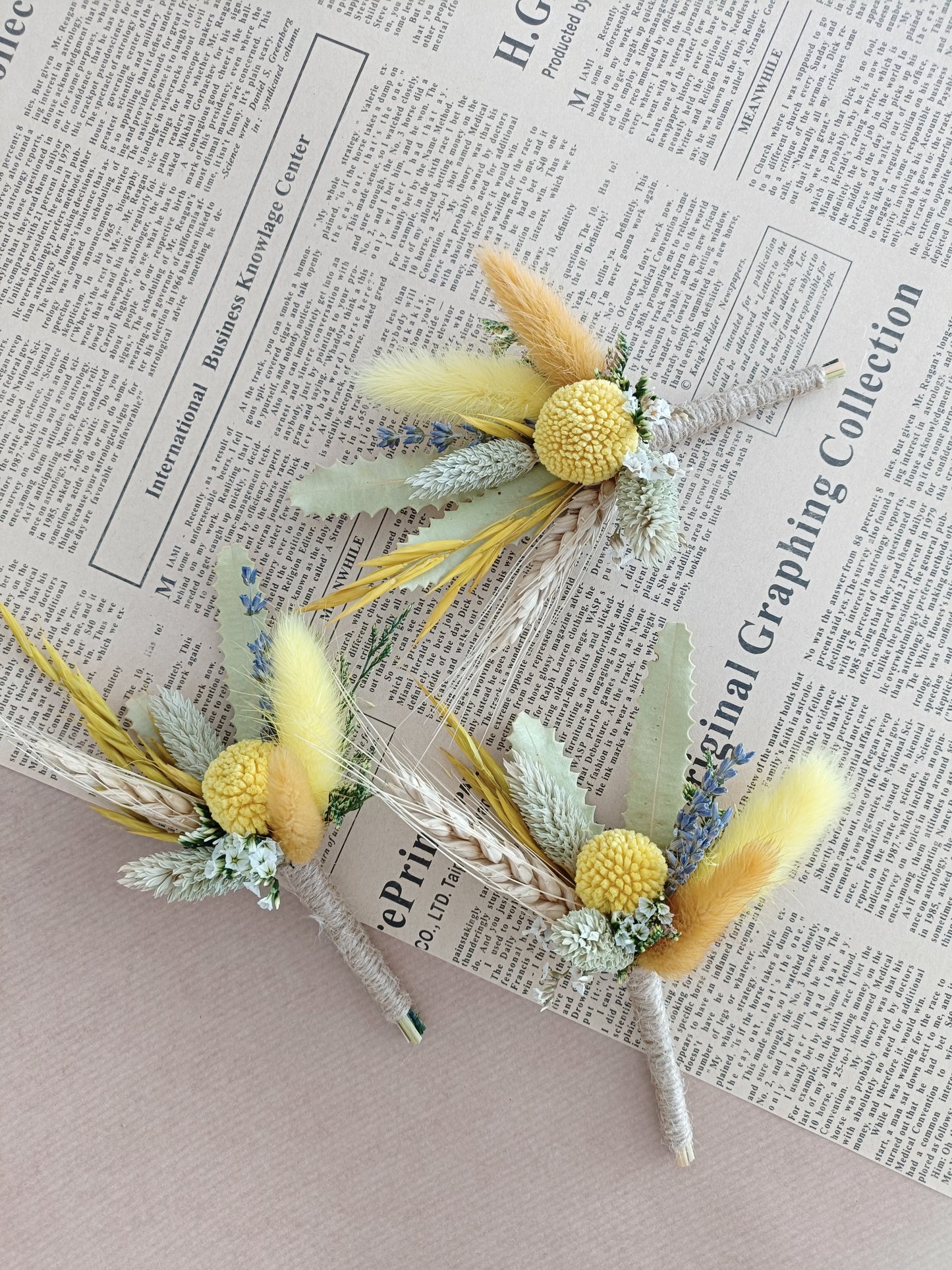 dried flower boutonnieres with yellow craspedia, bunny tails, and preserved foliage – ideal for rustic or boho weddings and groomsmen