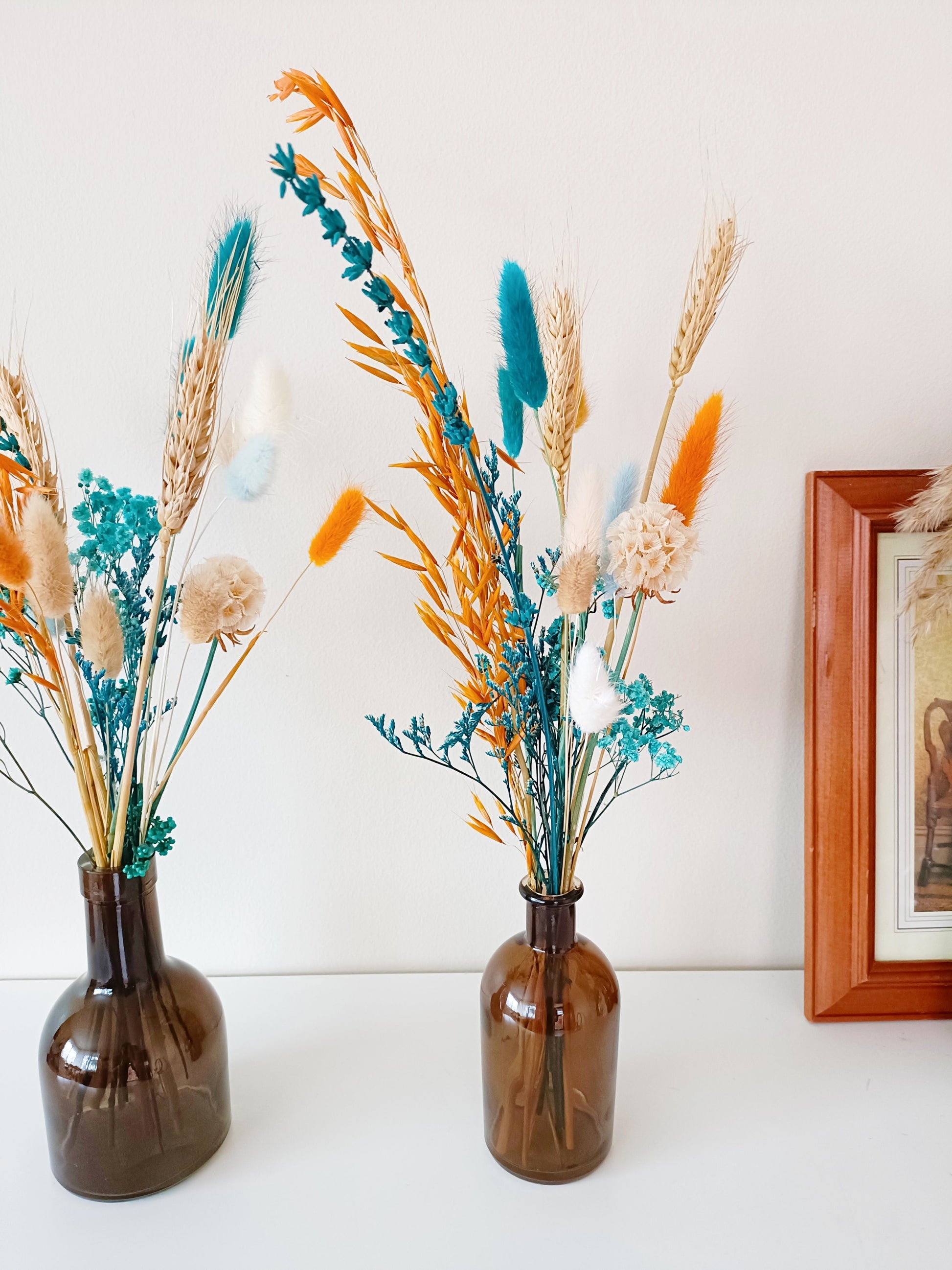 Boho centerpiece, dried flower decor, wedding table flowers, rustic floral arrangement, bohemian flower vase, minimalist floral styling, pampas grass arrangement, dried floral bouquet, neutral home decor, aesthetic flower setup, vintage flower display, farmhouse flower decor, pastel dried flowers, blush wedding centerpiece, romantic floral arrangement, natural dried bouquet, table wedding flowers, soft floral centerpiece, eco-friendly wedding flowers, preserved flower display, rustic wedding decor