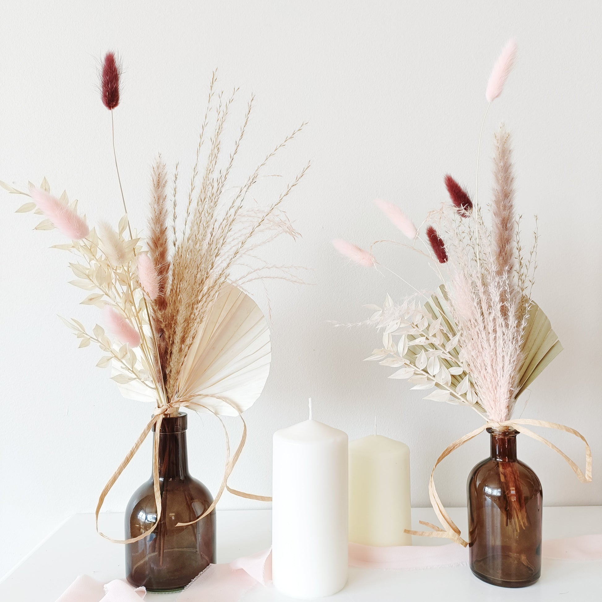 wedding table decor, event table styling, elegant centerpiece, floral arrangement, table setting, rustic wedding, boho table decor, vintage table setup, romantic tablescape, minimalist wedding decor, luxury event design, dried flower centerpiece, soft color palette, aesthetic table arrangement, candlelit dinner, natural wedding decor, modern table styling, cozy reception setup, timeless elegance, pastel wedding theme, chic tablescape, organic table decor, sophisticated floral design, intimate wedding setup