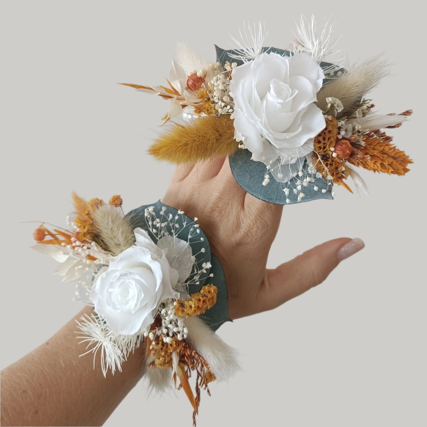 Set of two dried flower wrist corsages with white rose, golden grasses and preserved greenery
