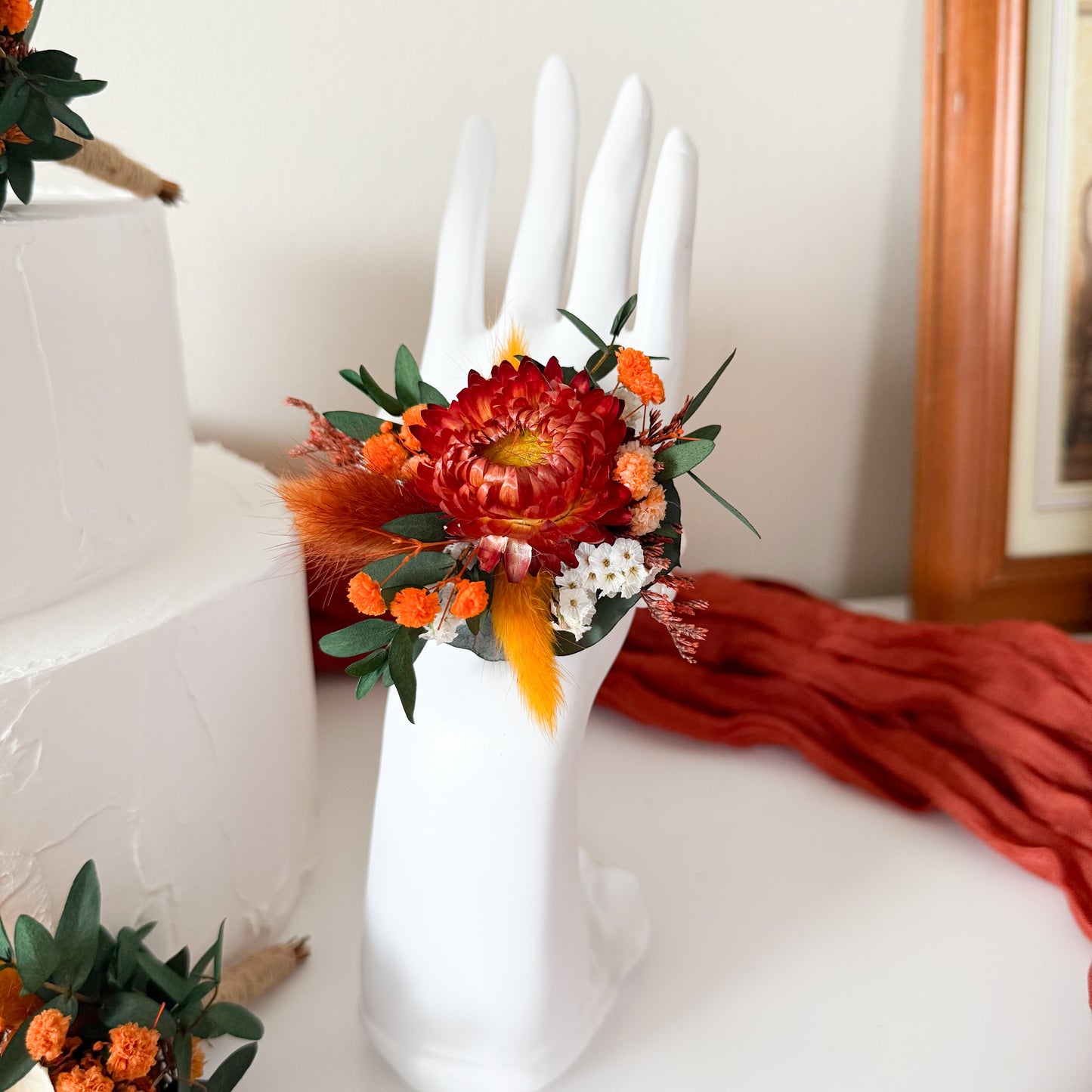 Rustic wedding boutonniere in burnt orange and ivory shades with preserved greenery and sola wood rose. Handcrafted accessory for groom or groomsmen, matching boho bridal bouquet and bridesmaid hairpins. Natural dried flower design perfect for country and beach weddings