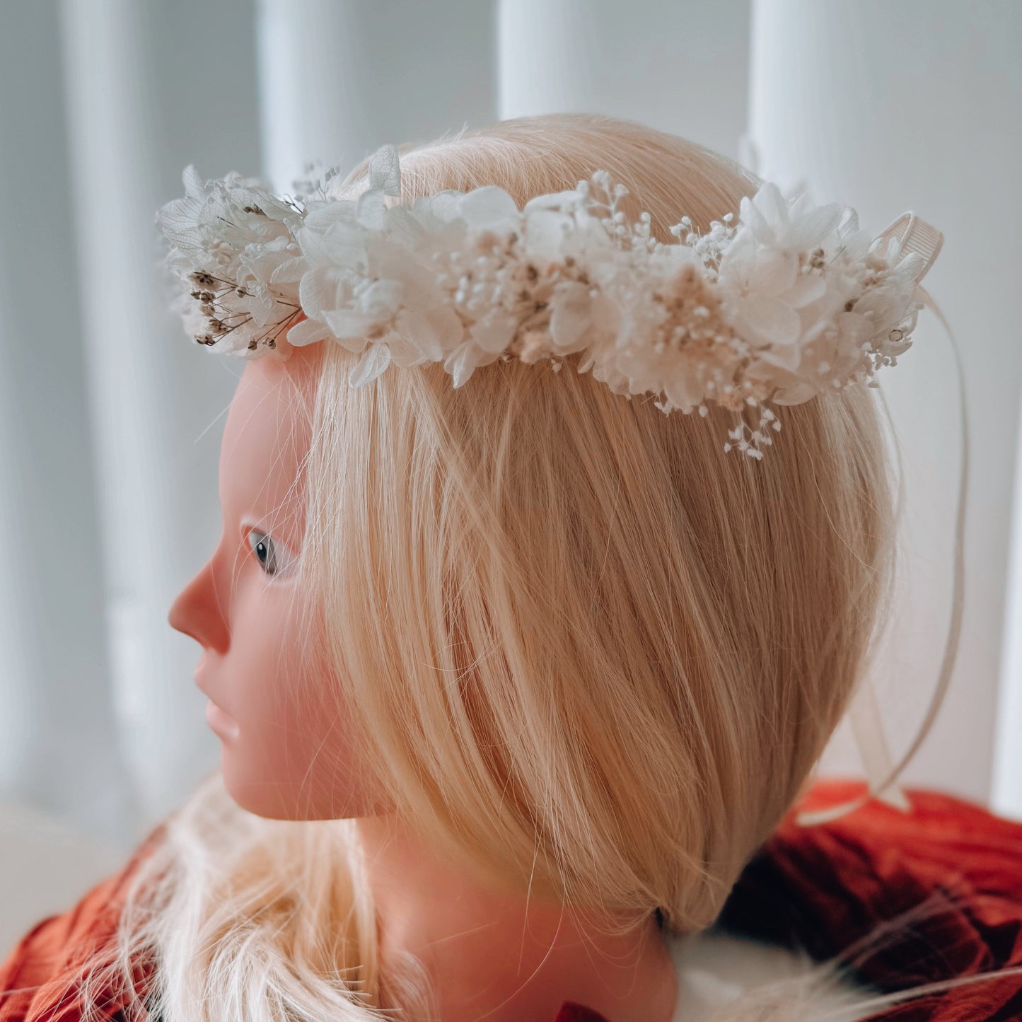 Side view of bridal flower crown in white, romantic floral halo on long blonde hair