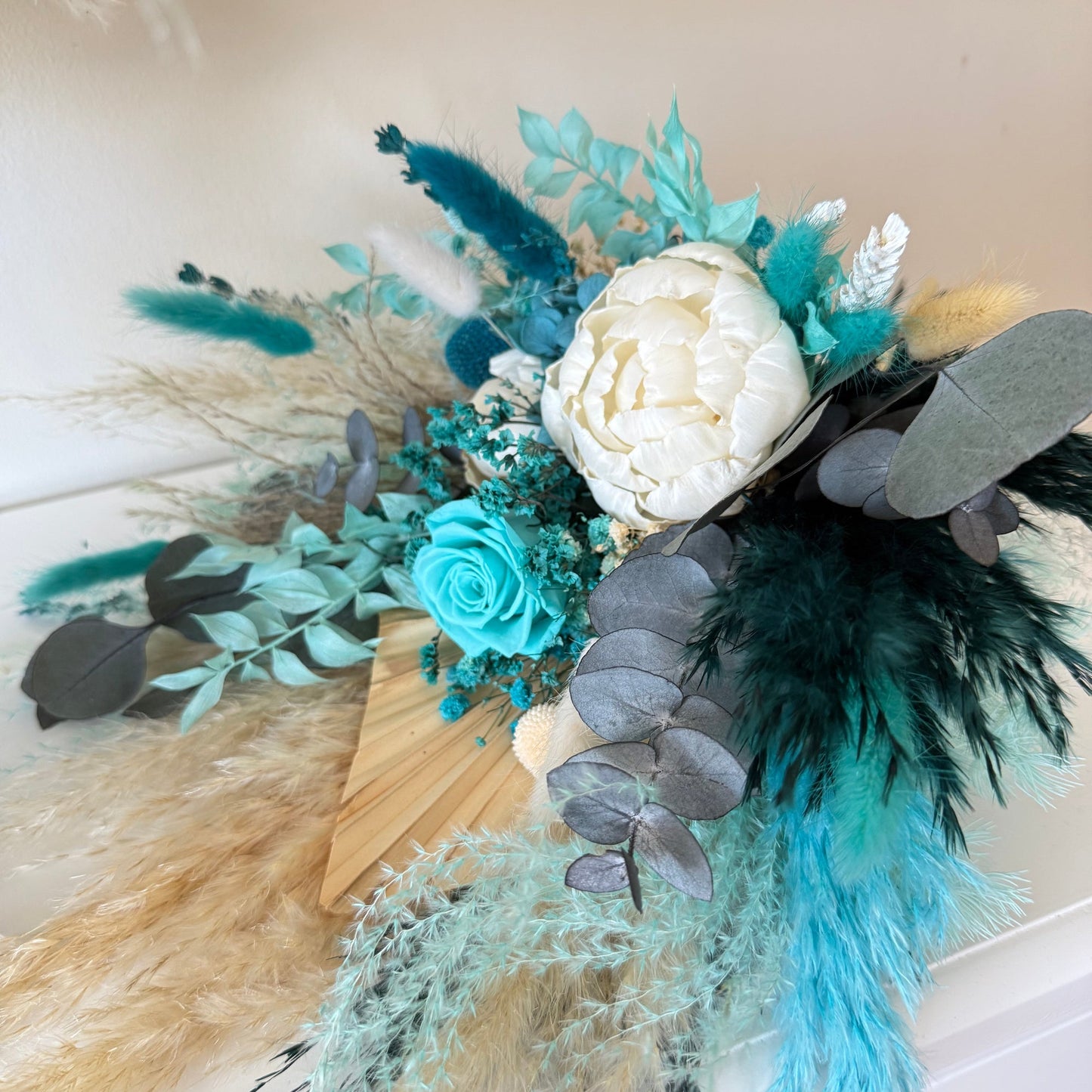 Bridesmaids Bouquet of flowers with teal, white, and beige elements