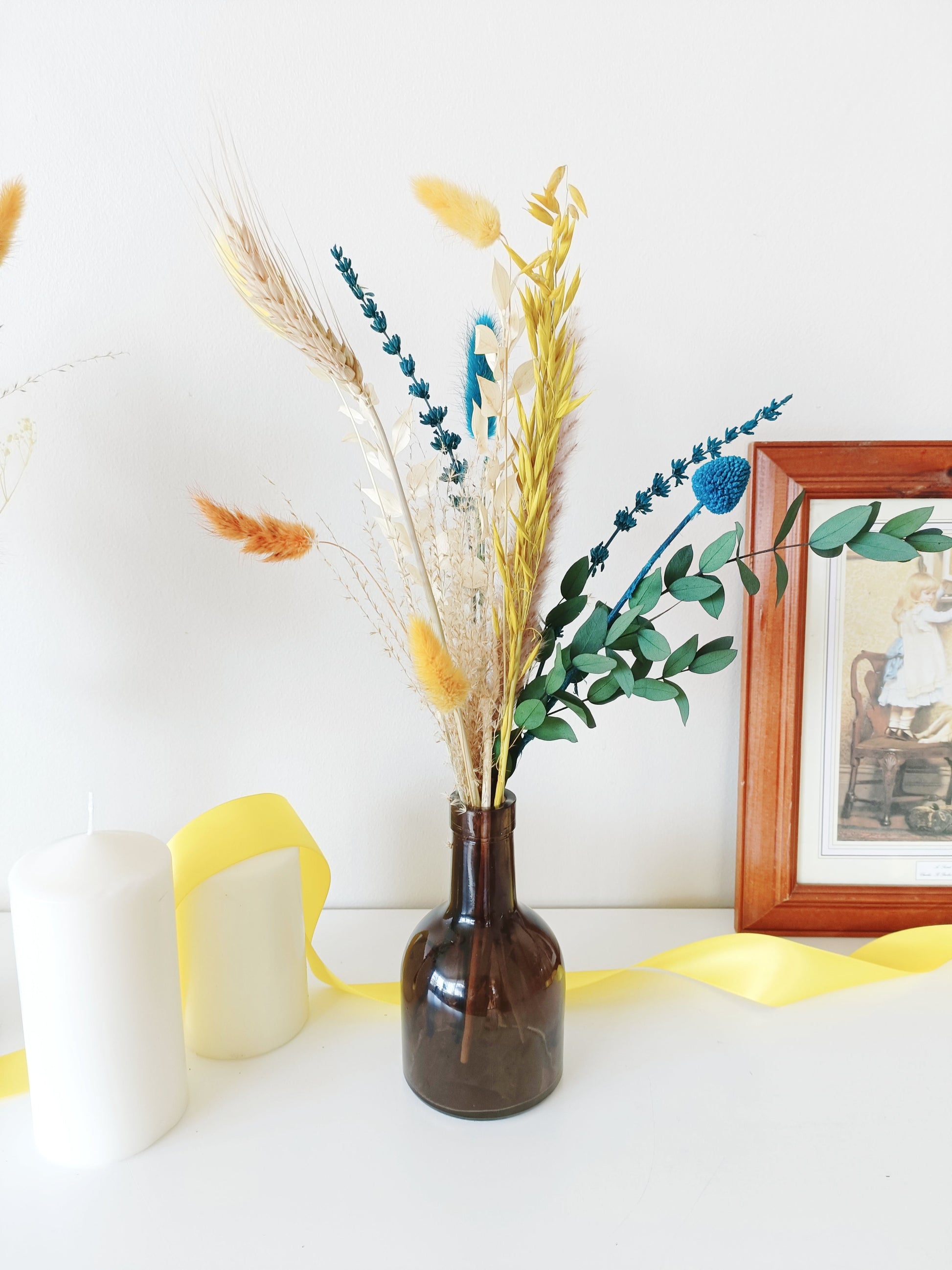 colorful natural centerpiece, terracotta and blue flowers , eye-catching floral vase, handcrafted dried bouquet, unexpected floral styling, creative table florals, intense color dried bouquet, artsy floral centerpiece, autumn wedding flowers, modern bohemian flower decor, unconventional floral styling, trendy wedding floral setup, statement dried flower decor, energetic boho wedding decor, burnt orange wedding bouquet, bold color flower styling, dynamic floral table decor, festive floral arrangement