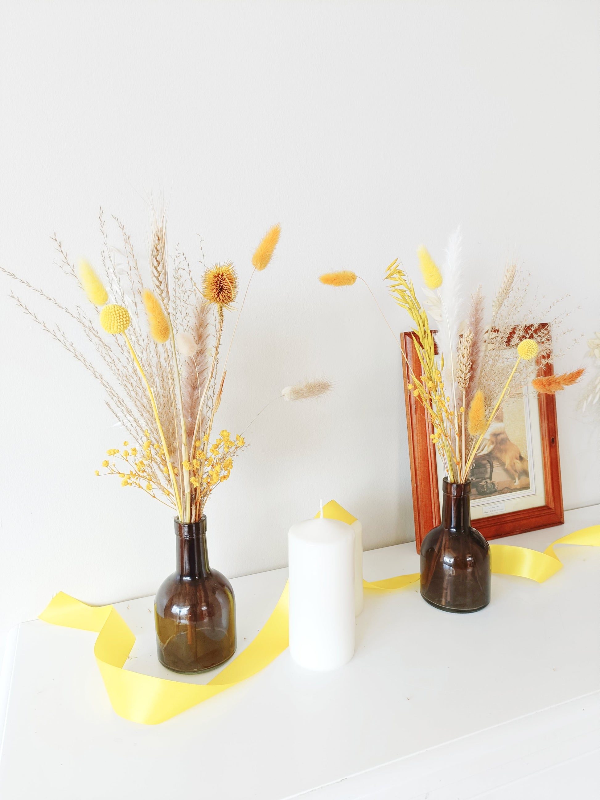 wedding table decor, event table styling, elegant centerpiece, floral arrangement, table setting, rustic wedding, boho table decor, vintage table setup, romantic tablescape, minimalist wedding decor, luxury event design, dried flower centerpiece, soft color palette, aesthetic table arrangement, candlelit dinner, natural wedding decor, modern table styling, cozy reception setup, timeless elegance, pastel wedding theme, chic tablescape, organic table decor, sophisticated floral design, intimate wedding setup