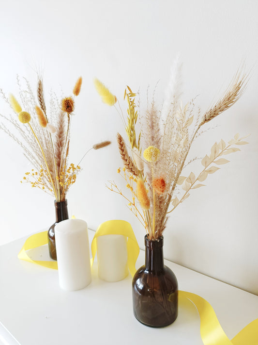 wedding table decor, event table styling, elegant centerpiece, floral arrangement, table setting, rustic wedding, boho table decor, vintage table setup, romantic tablescape, minimalist wedding decor, luxury event design, dried flower centerpiece, soft color palette, aesthetic table arrangement, candlelit dinner, natural wedding decor, modern table styling, cozy reception setup, timeless elegance, pastel wedding theme, chic tablescape, organic table decor, sophisticated floral design, intimate wedding setup