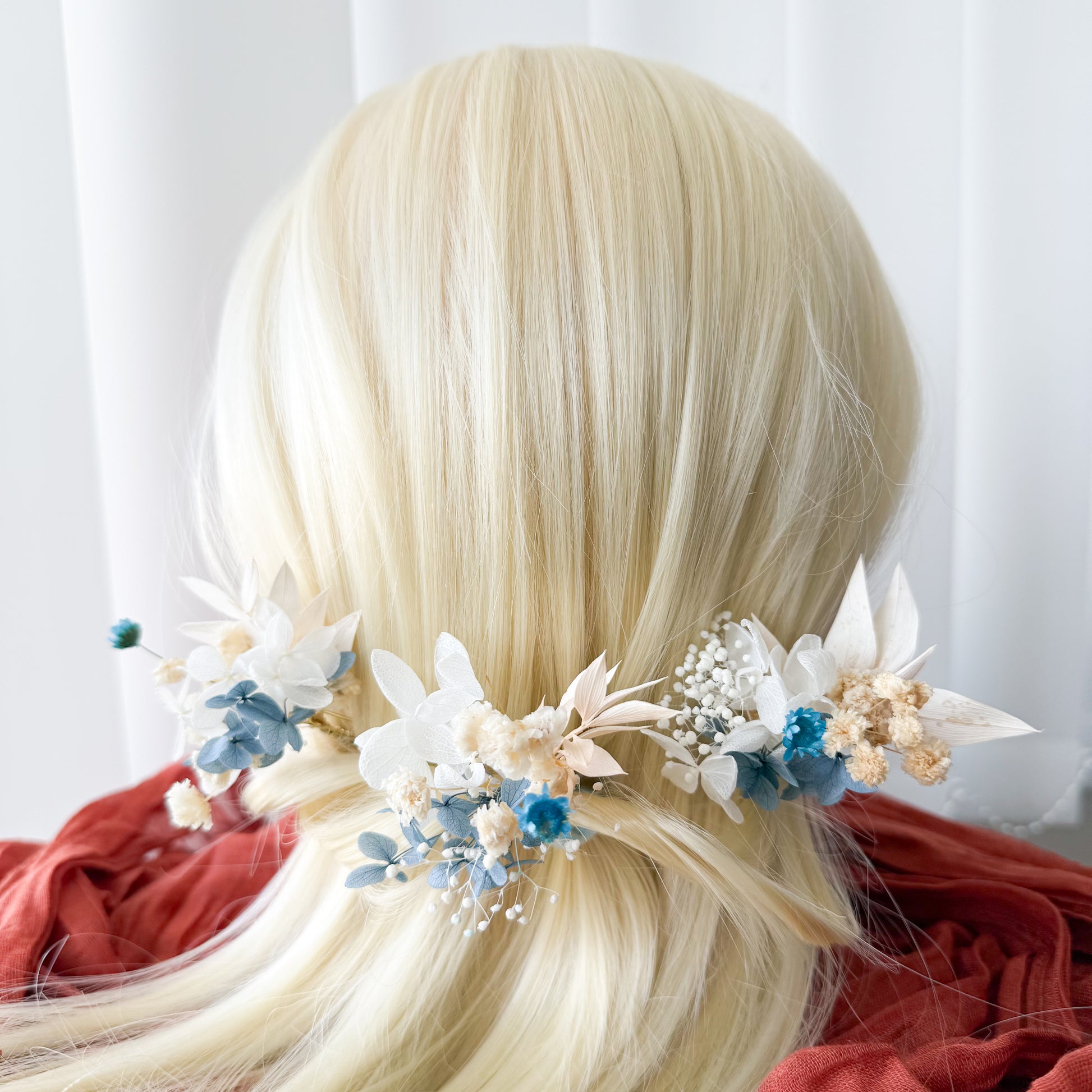 	Elegant blue flower hair pins for wedding updo or bridesmaid look