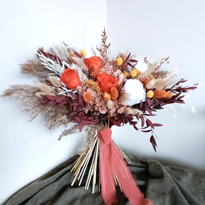 Rust bridal bouquet, terracotta wedding flowers, bridal bouquet in burgundy, Burgundy boho bridal bouquet arrangement, Wedding bouquet, dried bouquet. Dried floral arrangement, Dried everlasting bouquet Boho Dried Flower Bouquet with Teal Flowers  Elevate your space with our Boho Dried Flower Bouquet featuring stunning burnt orange flowers. This handcrafted bouquet combines natural beauty with vibrant rust orange tones, perfect for adding a touch of bohemian charm to any setting. 