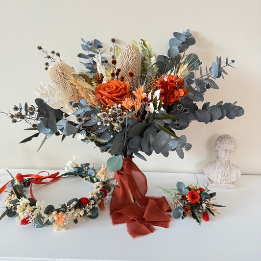 Bridal Bouquet of flowers with a rust orange rose