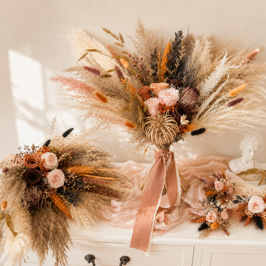 Rustic wedding bouquet with pampas grass, blush roses and preserved dried flowers.