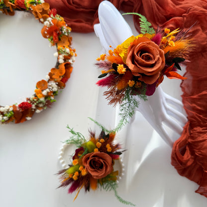Rust and terracotta dried flower wrist corsage with preserved roses and native Australian foliage
