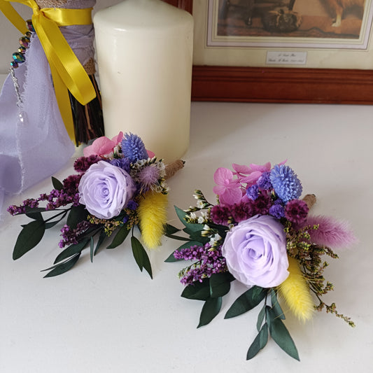 Boho groom boutonniere in soft purple, lilac and blush tones with natural textures