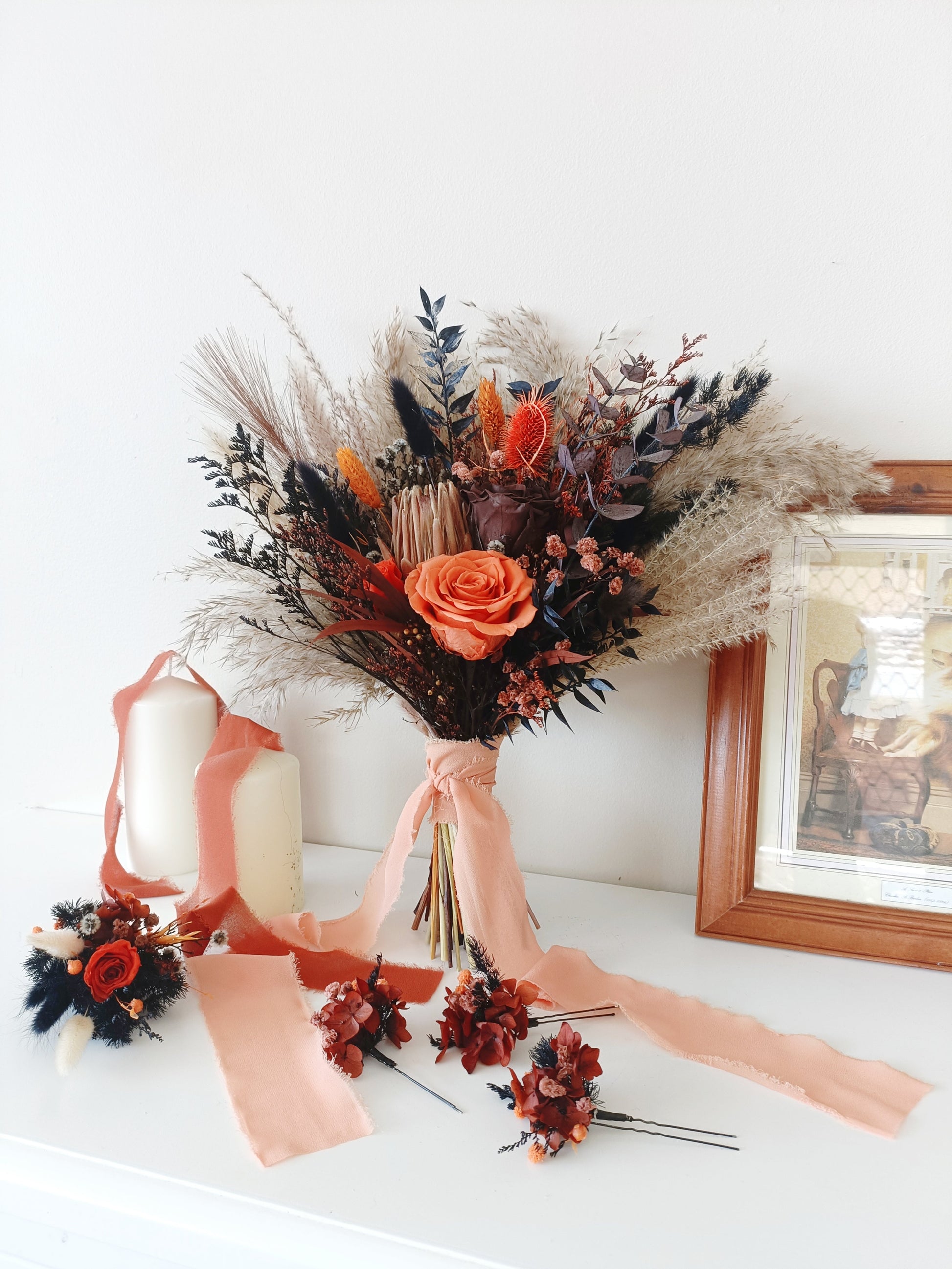 Boho wedding bouquet set with pampas grass, preserved rose, navy eucalyptus, and terracotta tones – ideal for autumn or rustic weddings.