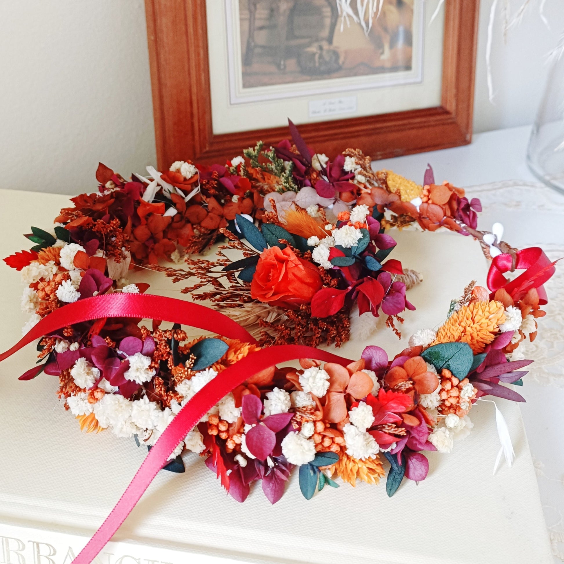 Boho wedding flower crown and boutonniere set made of dried flowers in terracotta, burgundy, and ivory tones with red ribbon