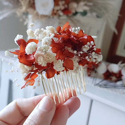 Boho wedding hairpiece set featuring terracotta florals, white accents, and natural textures