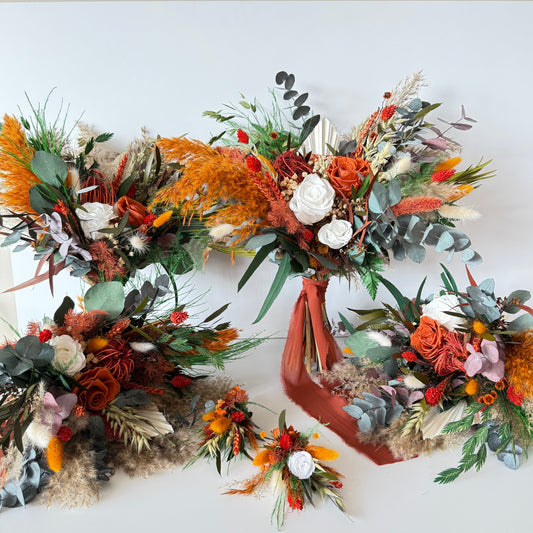 Boho bridal bouquet set in burnt orange and terracotta tones with preserved roses, eucalyptus, pampas grass and rustic dried flowers