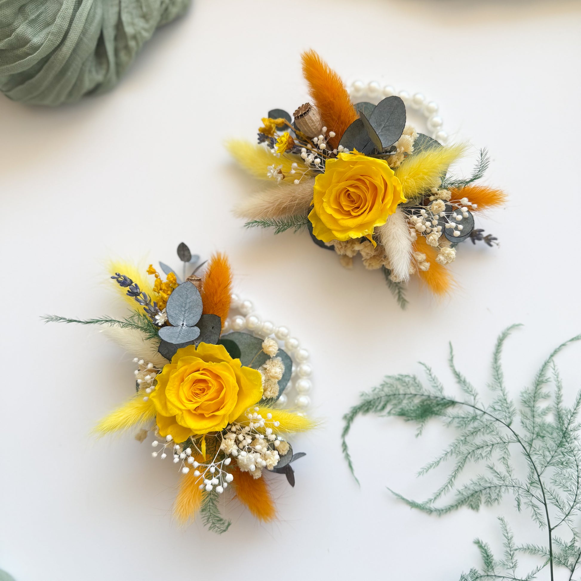 Bright yellow dried corsage set made with preserved roses, billy buttons, eucalyptus, and bunny tails â€” handmade rustic wedding accessory for groom and groomsmen