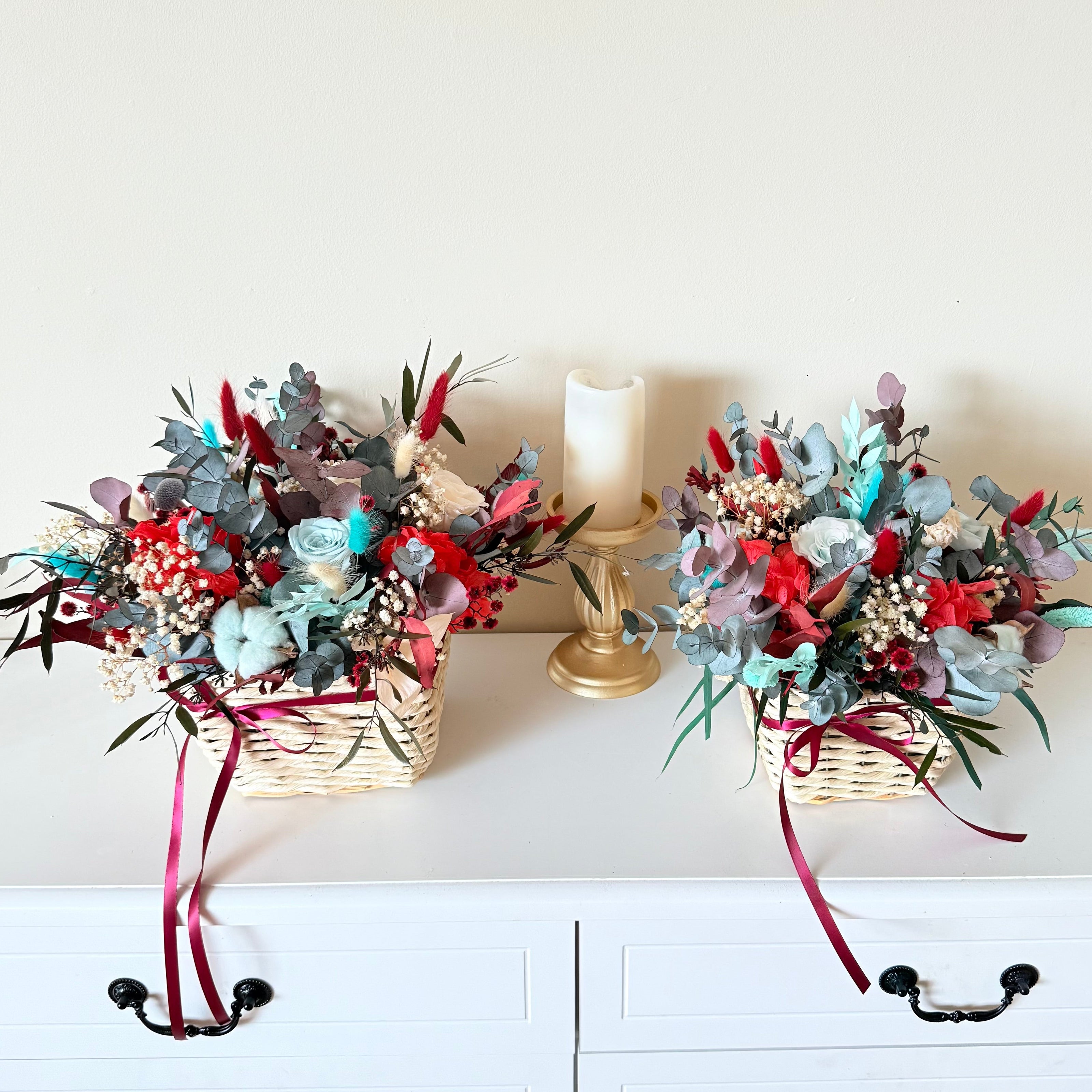 Small and large Christmas dried flower baskets featuring red, mint and natural tones, handmade holiday decoration.