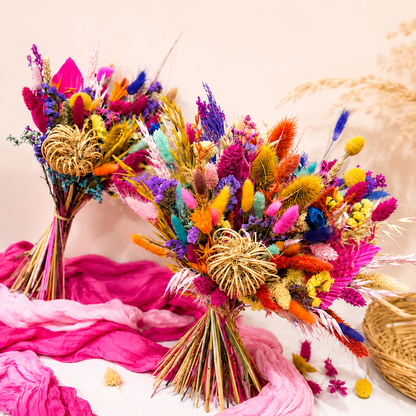 Handcrafted rainbow dried bridal bouquet featuring vibrant preserved flowers in pink, purple, orange, yellow and blue, perfect for a colourful boho wedding in Australia