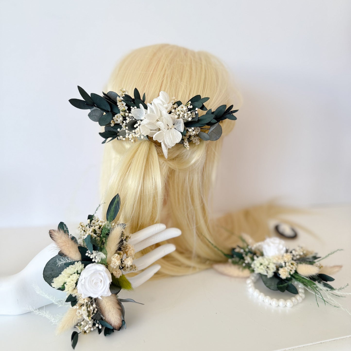 Elegant dried flower hair comb and wrist corsage in olive green, ivory and natural beige tones, perfect for boho or rustic weddings