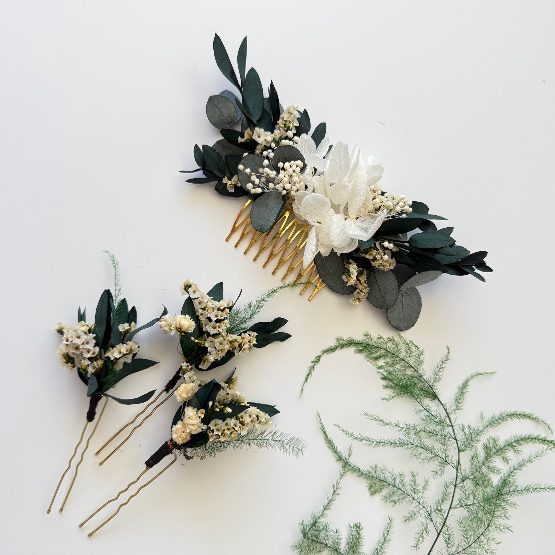 Handmade dried flower comb and corsage in neutral natural colours with preserved greenery
