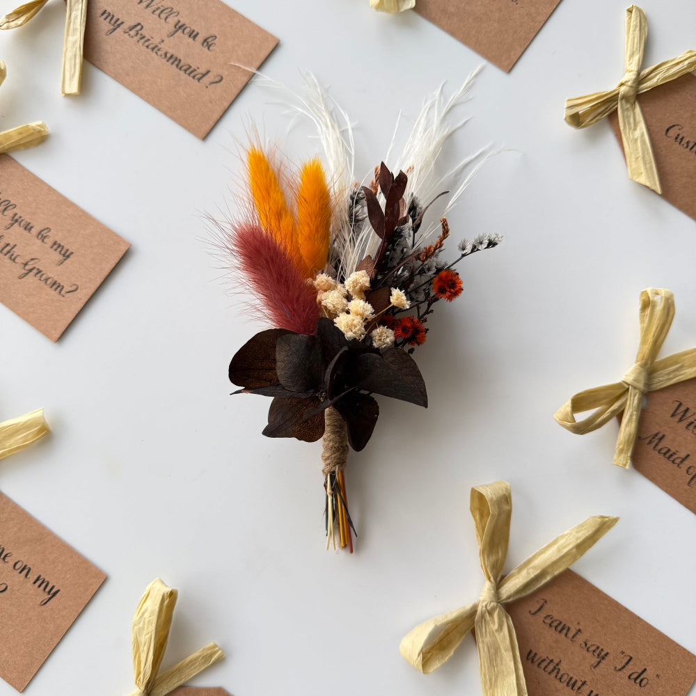 Dried flower arrangement with rustic tags on a white background