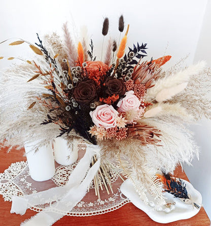 Elegant neutral bridal bouquet with pampas plumes and preserved blush flowers