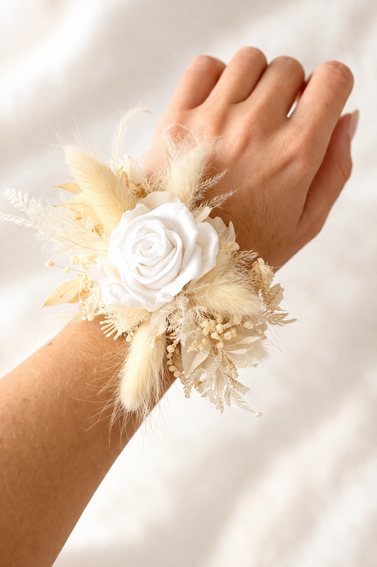 Wedding wrist corsage in ivory tones