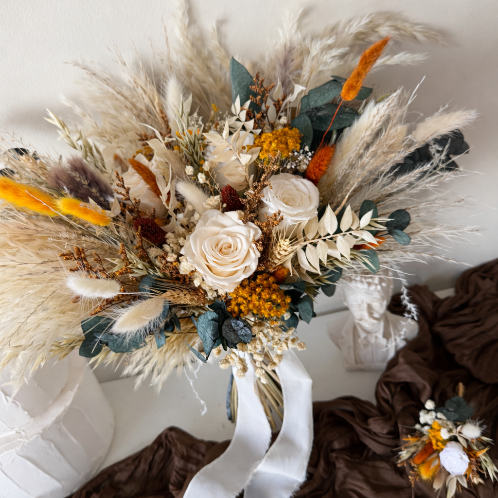 Ivory boho bridal bouquet with preserved roses, pampas grass, bunny tails and eucalyptus wedding flowers