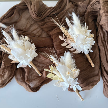 Ivory boho boutonniere with dried flowers, pampas grass and preserved botanicals