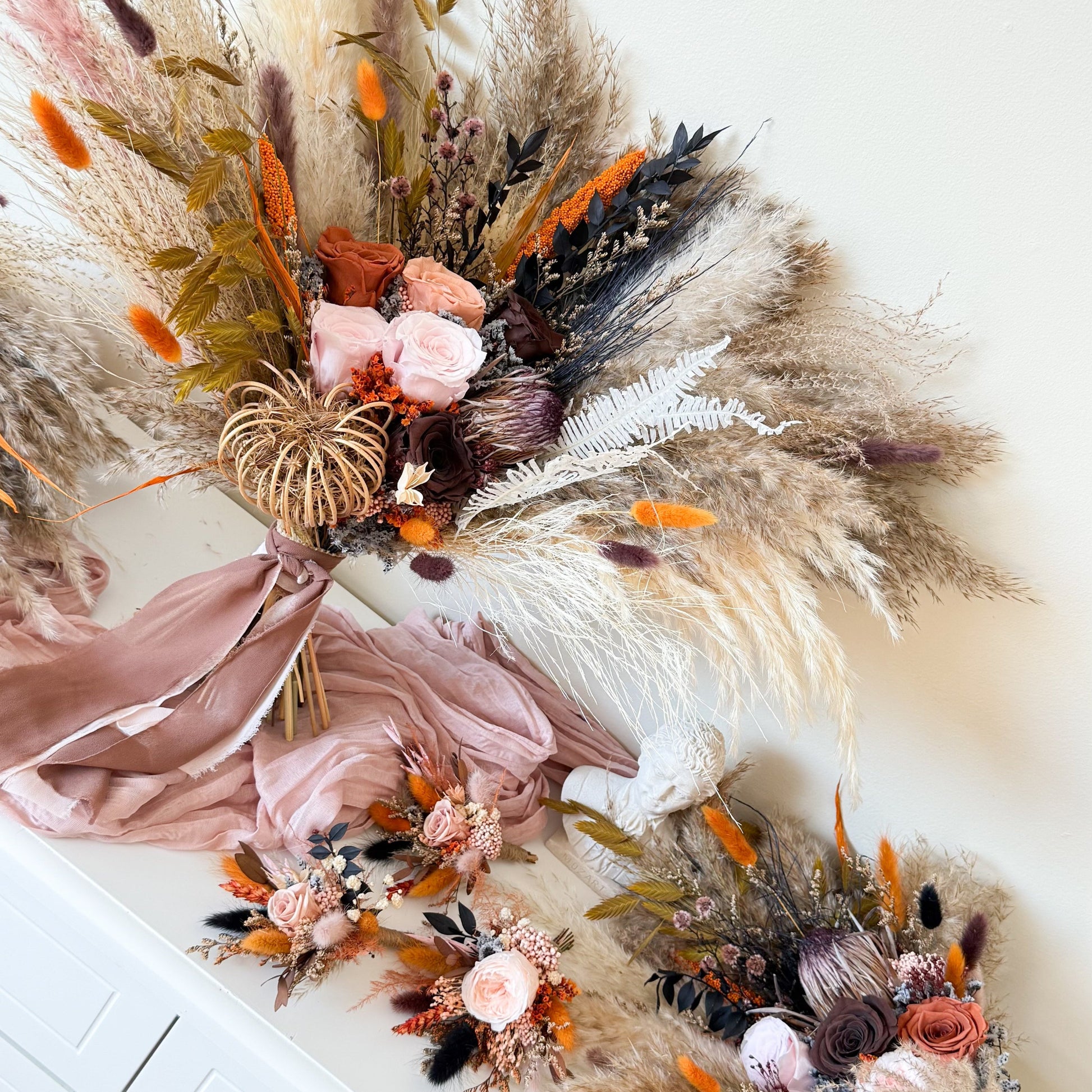 Luxury dried flower wedding collection with pampas bouquet and matching floral accessories.