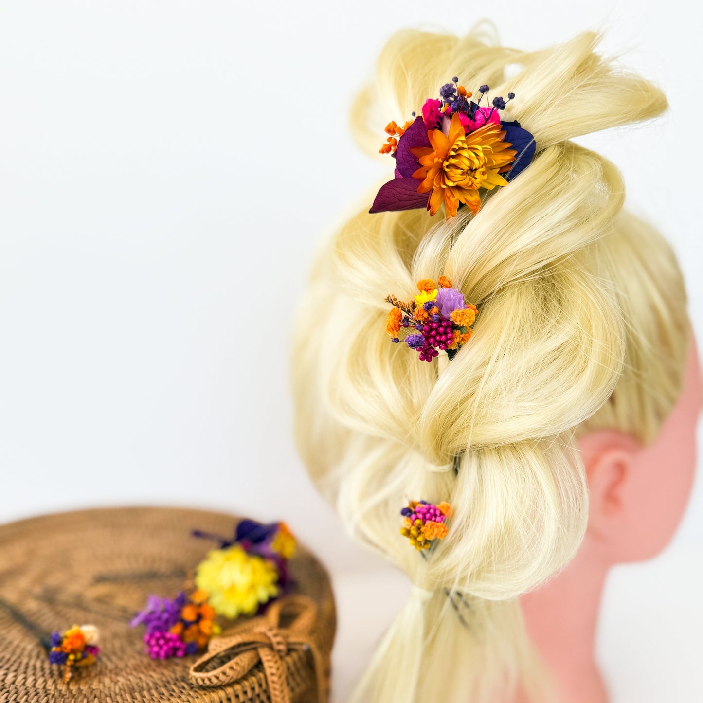 Set of dried flower hair pins arranged in blonde updo, boho wedding hair accessories