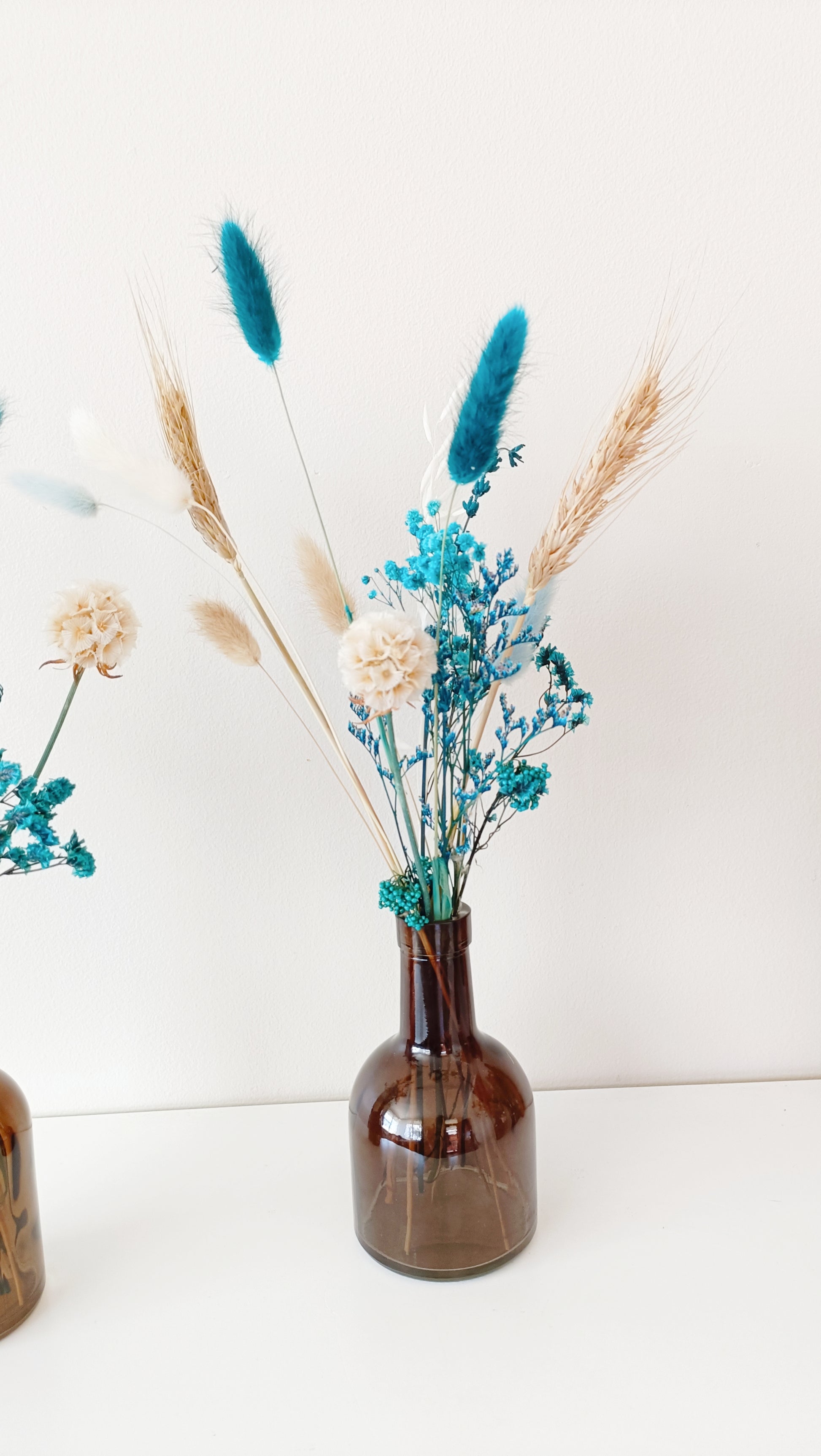 Teal bud vase, bud vase flowers, teal floral decor, mini vase arrangement, small flower bouquet, elegant table decor, wedding bud vase, minimalist florals, teal wedding decor, rustic bud vase, floral table centerpiece, soft blue-green flowers, chic home decor, petite floral arrangement, boho bud vase