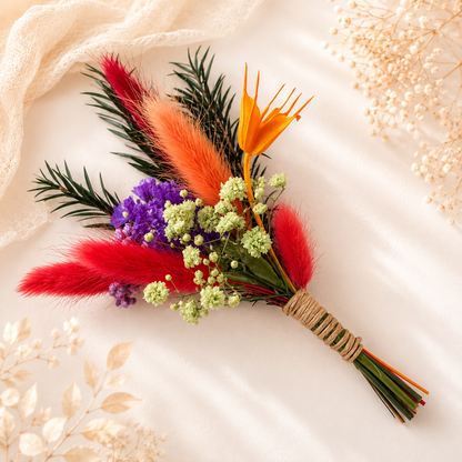 Mini dried flower bouquet with orange bird of paradise, preserved flowers and colourful accents for unique bridesmaid proposal gifts.