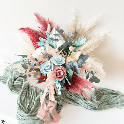 Australian dried wedding bouquet in seafoam, blush and mint tones — preserved eucalyptus, sola wood roses, fluffygrass accents