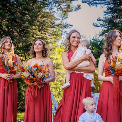 Bridesmaids holding Australian Native wedding bouquets featuring banksia and preserved eucalyptus