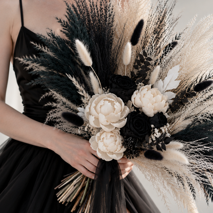Black and white dried bridal bouquet with preserved flowers, pampas grass and dark foliage
