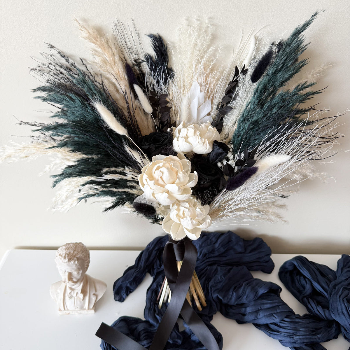 Black and white dried wedding flower set with bridal bouquet and matching floral accessories