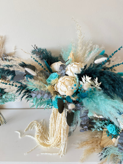 Boho bouquet with long pampas grass and teal flowers for wedding styling