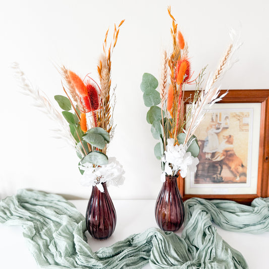 Boho dried flower arrangement in terracotta and orange tones with preserved eucalyptus and white hydrangea, handmade in Australia and sold without vase