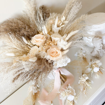 Side view of pampas grass dried flower bouquet with ivory roses