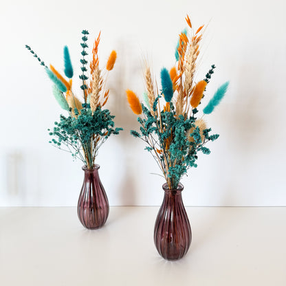 Boho dried flower vase decor in teal, orange, and natural tones with preserved eucalyptus and bunny tails, perfect for home or wedding styling