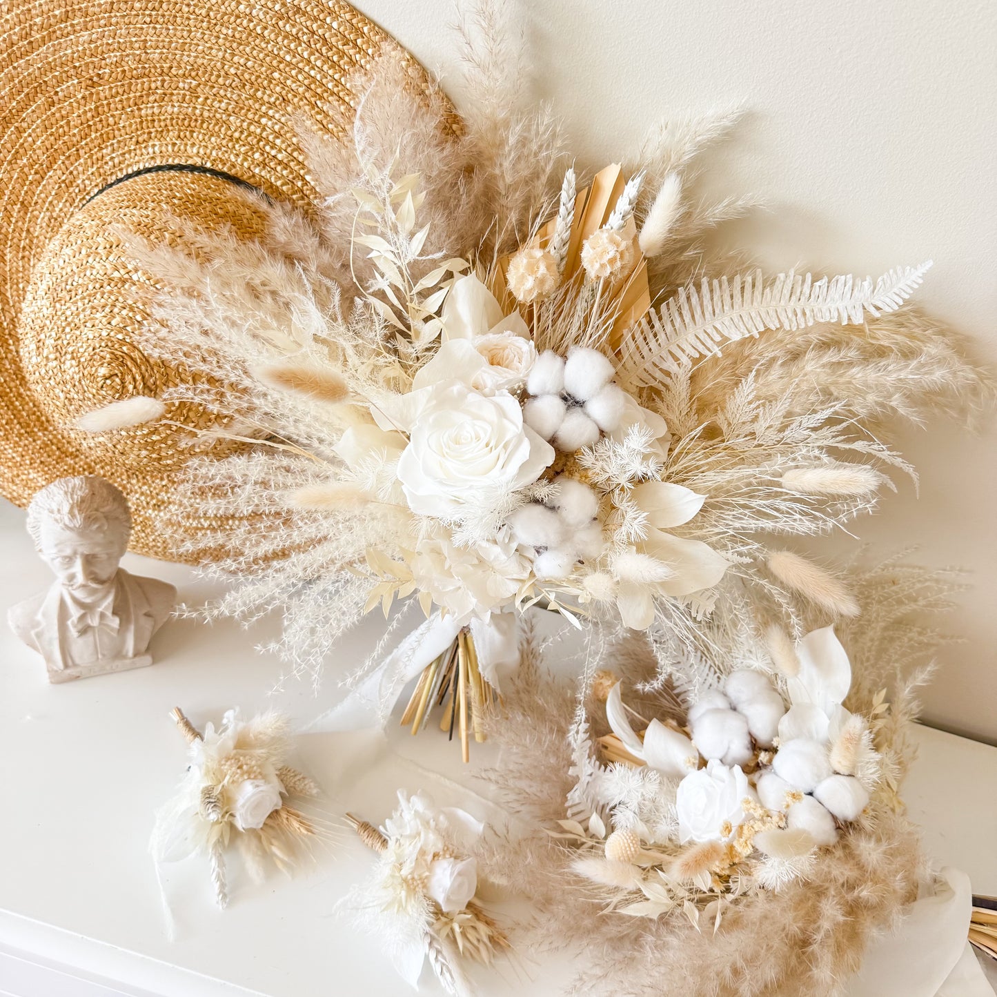 Boho ivory wedding bouquet made with preserved roses, cotton and beige dried florals